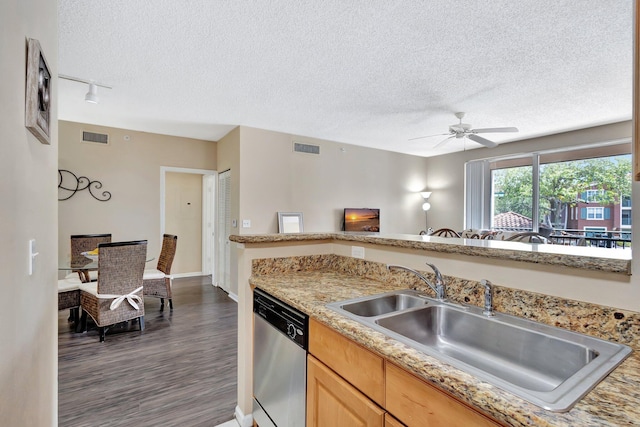 11760 Saint Andrews Pl Unit 204, Wellington, FL 33414 - kitchen featuring dishwasher, a textured ceiling, visible vents, and light countertops