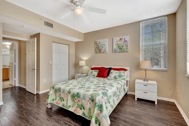 11760 Saint Andrews Pl Unit 204, Wellington, FL 33414 - bedroom with baseboards, wood finished floors, and visible vents