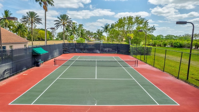 11760 Saint Andrews Pl Unit 204, Wellington, FL 33414 - view of tennis court with fence