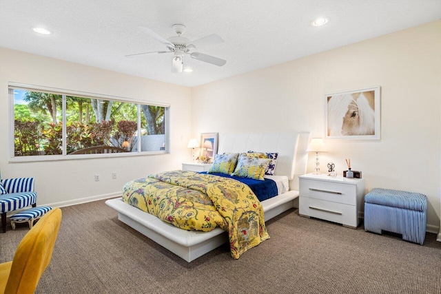 bedroom with carpet floors, baseboards, and recessed lighting