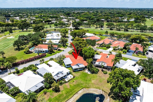bird's eye view with a residential view, a water view, and golf course view