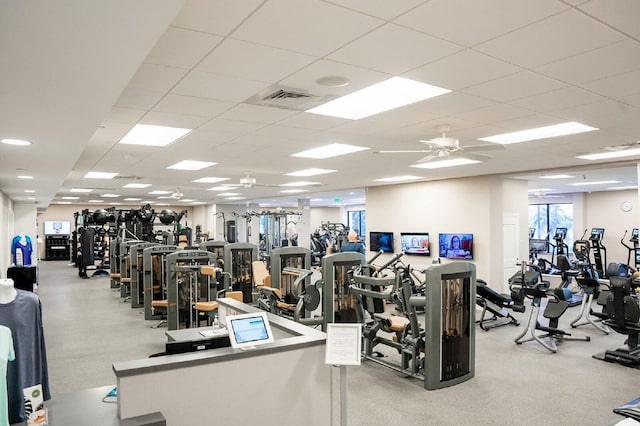 workout area featuring ceiling fan and visible vents