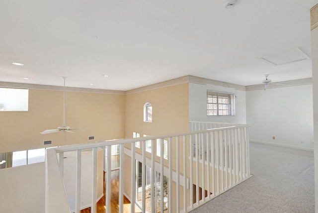 corridor featuring carpet, visible vents, baseboards, and recessed lighting