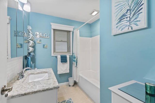 full bath with shower / bath combo, vanity, baseboards, tile patterned flooring, and visible vents