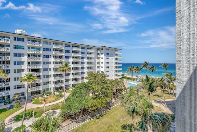 view of building exterior featuring a water view