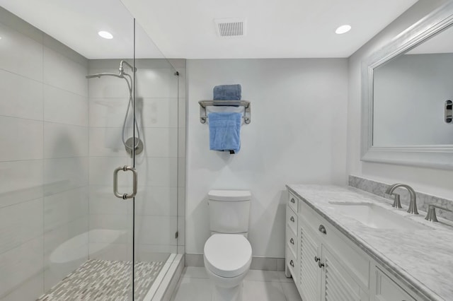 full bathroom featuring toilet, a stall shower, visible vents, recessed lighting, and vanity