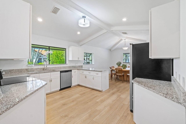 kitchen featuring a peninsula, light wood-type flooring, visible vents, white cabinetry, and appliances with stainless steel finishes