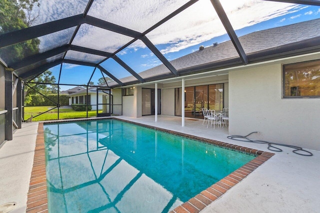 pool with a patio area and a lanai