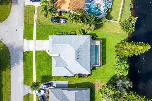 drone / aerial view with a water view