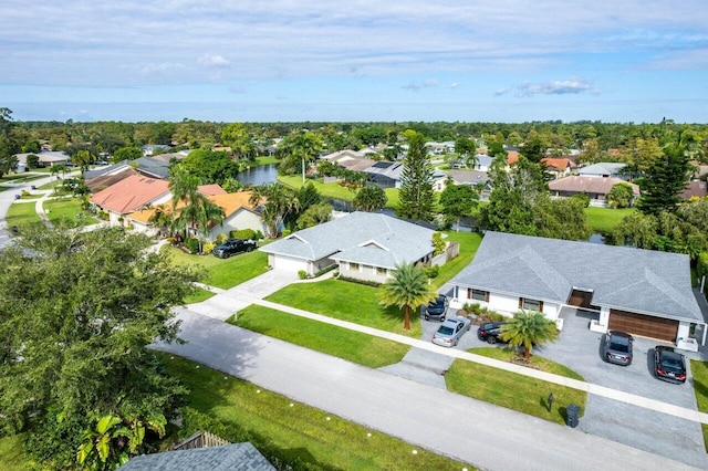 aerial view featuring a residential view and a water view