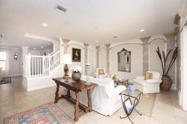 living area with ornate columns, stairs, recessed lighting, light tile patterned floors, and baseboards