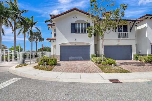 4721 N Prive Cir, Delray Beach, FL 33445 - view of front of house featuring a garage and stucco siding