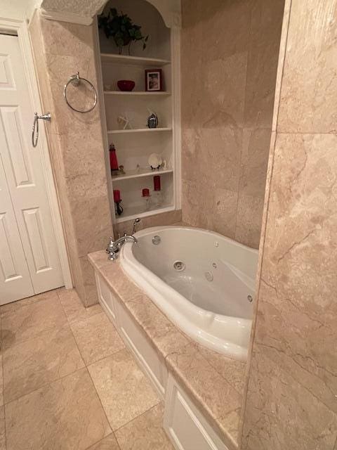 1028 SE 13th Ct, Deerfield Beach, FL 33441 - full bathroom with a whirlpool tub and tile patterned flooring