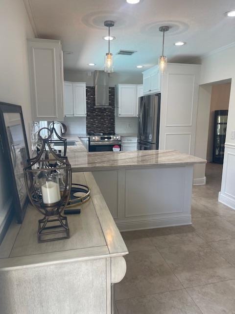 1028 SE 13th Ct, Deerfield Beach, FL 33441 - kitchen with visible vents, freestanding refrigerator, range hood, light countertops, and electric stove