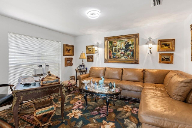 living area featuring visible vents