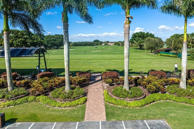 view of yard featuring view of golf course