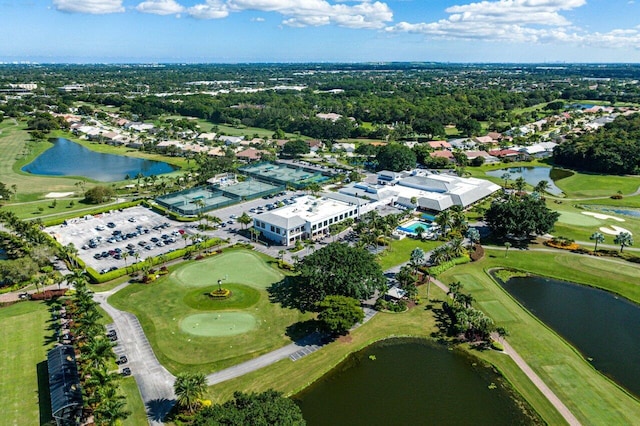 bird's eye view with a residential view, golf course view, and a water view