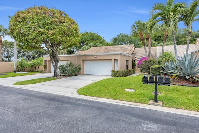 11206 Applegate Cir, Boynton Beach, FL 33437 - ranch-style house with an attached garage, a tiled roof, a front yard, and concrete driveway