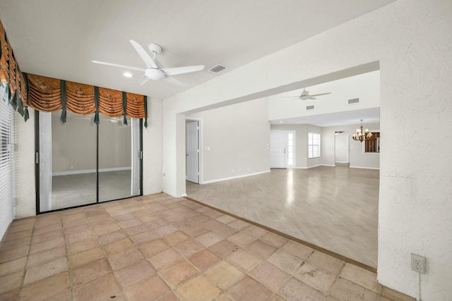 11206 Applegate Cir, Boynton Beach, FL 33437 - spare room featuring baseboards, visible vents, and ceiling fan with notable chandelier