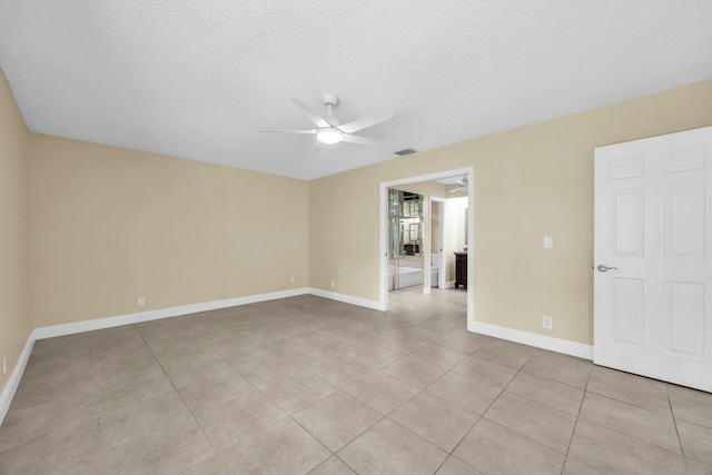 11206 Applegate Cir, Boynton Beach, FL 33437 - spare room featuring baseboards, visible vents, light tile patterned floors, and a ceiling fan