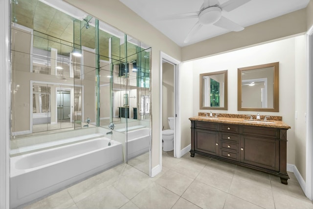 11206 Applegate Cir, Boynton Beach, FL 33437 - bathroom featuring toilet, a ceiling fan, a sink, and a garden tub