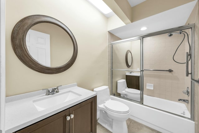 11206 Applegate Cir, Boynton Beach, FL 33437 - bathroom featuring shower / bath combination with glass door, vanity, toilet, and tile patterned flooring