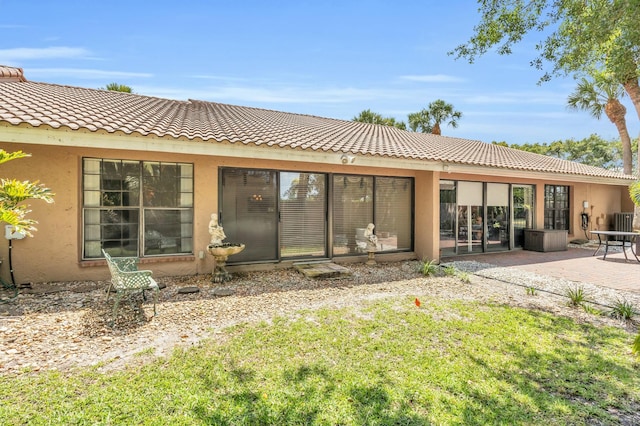 11206 Applegate Cir, Boynton Beach, FL 33437 - back of property with stucco siding, a tiled roof, and a patio area