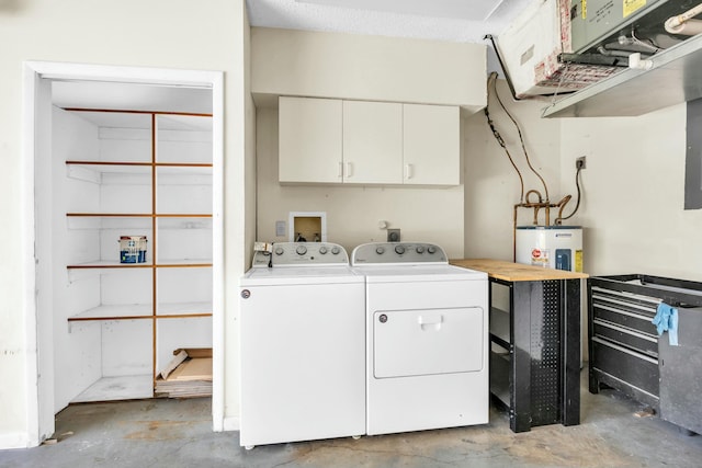 11206 Applegate Cir, Boynton Beach, FL 33437 - laundry room with electric water heater, separate washer and dryer, and cabinet space