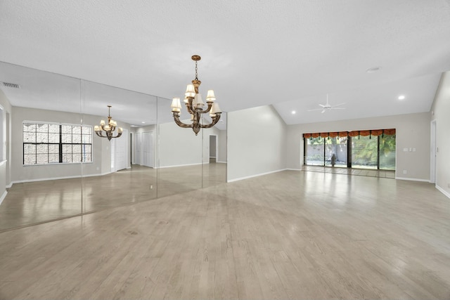 11206 Applegate Cir, Boynton Beach, FL 33437 - interior space with recessed lighting, light wood-style floors, visible vents, baseboards, and ceiling fan with notable chandelier