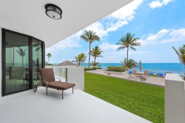 2917 S Ocean Blvd Unit 103, Highland Beach, FL 33487 - view of patio / terrace with a water view and a balcony