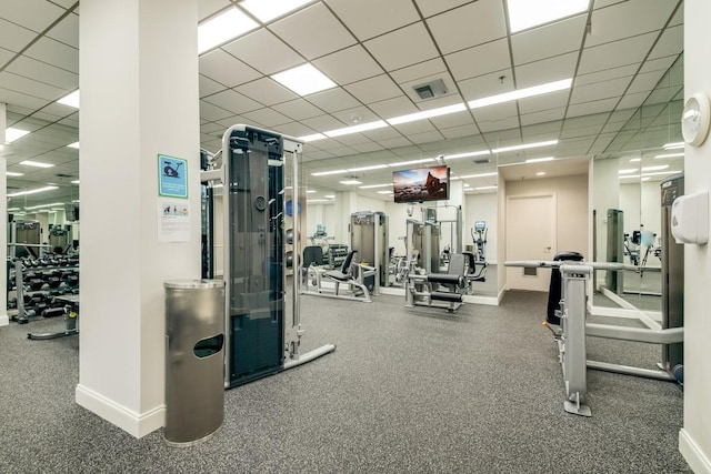 2917 S Ocean Blvd Unit 103, Highland Beach, FL 33487 - gym with visible vents, a drop ceiling, and baseboards