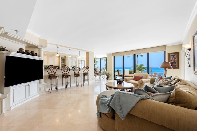 2917 S Ocean Blvd Unit 103, Highland Beach, FL 33487 - living area with marble finish floor, ornamental molding, and a wall of windows