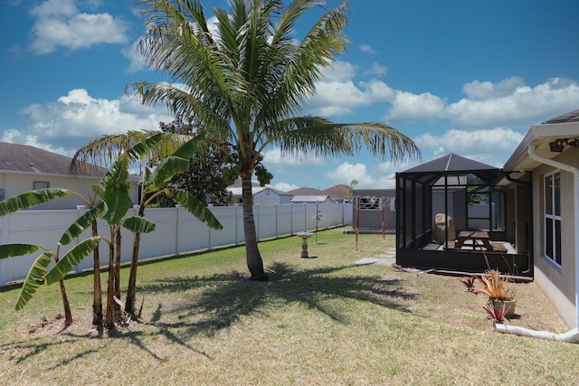 view of yard featuring a fenced backyard and a shed