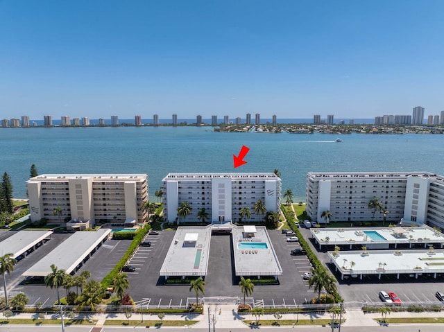 drone / aerial view with a water view and a view of city