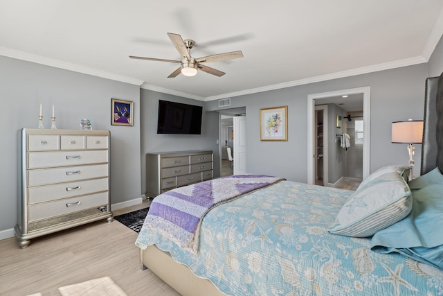 bedroom featuring baseboards, ornamental molding, visible vents, and light wood-type flooring