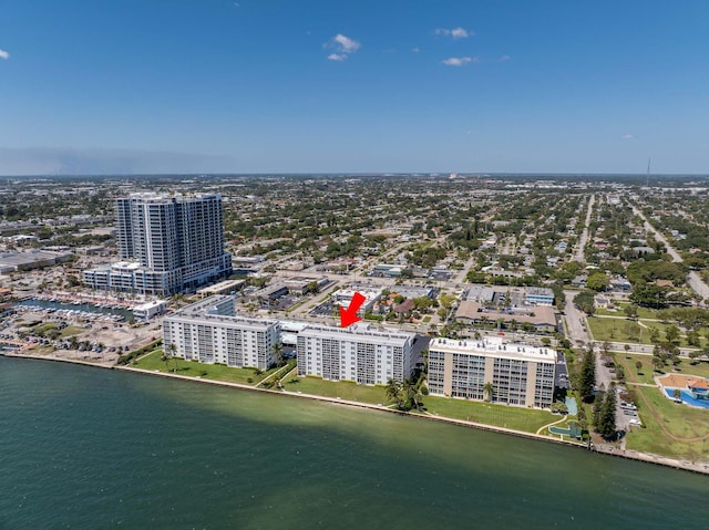 aerial view featuring a city view and a water view