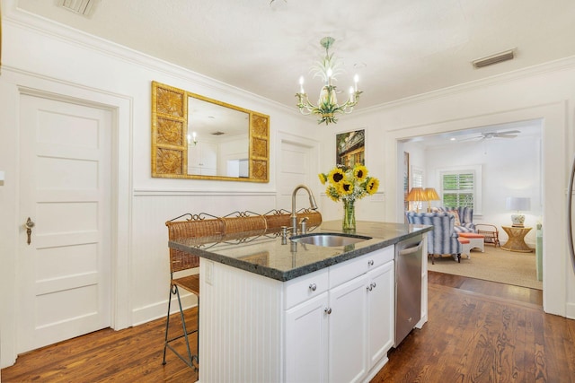 138 Greymon Dr, West Palm Beach, FL 33405 - kitchen with visible vents, dishwasher, a sink, white cabinets, and dark stone counters