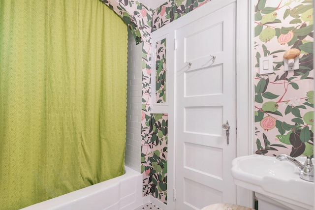 138 Greymon Dr, West Palm Beach, FL 33405 - bathroom with a sink and shower / tub combo