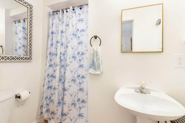 138 Greymon Dr, West Palm Beach, FL 33405 - bathroom with toilet and a shower with curtain