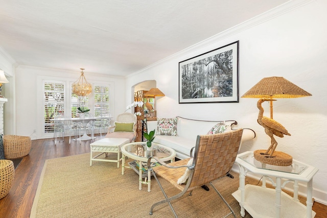 138 Greymon Dr, West Palm Beach, FL 33405 - living area featuring arched walkways, ornamental molding, and wood finished floors