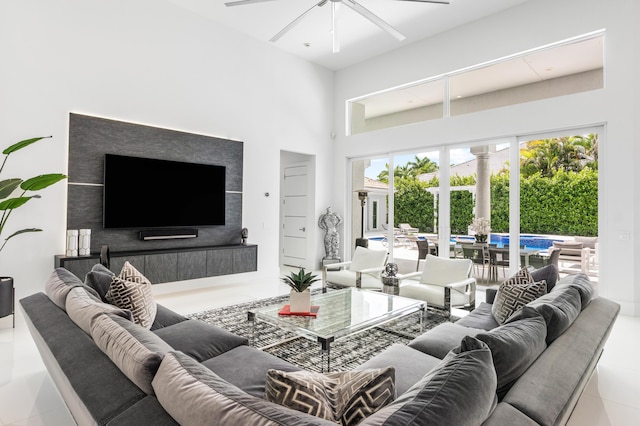 5784 Vintage Oaks Cir, Delray Beach, FL 33484 - living room with ceiling fan, plenty of natural light, tile patterned flooring, and a high ceiling