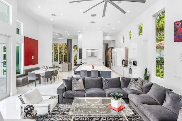 5784 Vintage Oaks Cir, Delray Beach, FL 33484 - living area featuring recessed lighting, a high ceiling, a ceiling fan, and visible vents