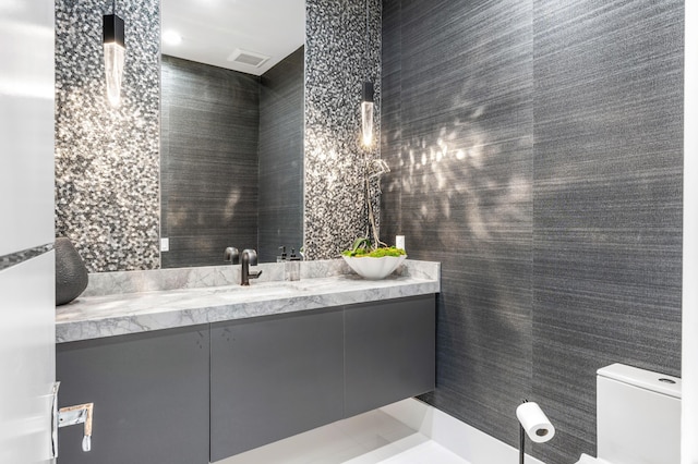 5784 Vintage Oaks Cir, Delray Beach, FL 33484 - bathroom with toilet, visible vents, and vanity