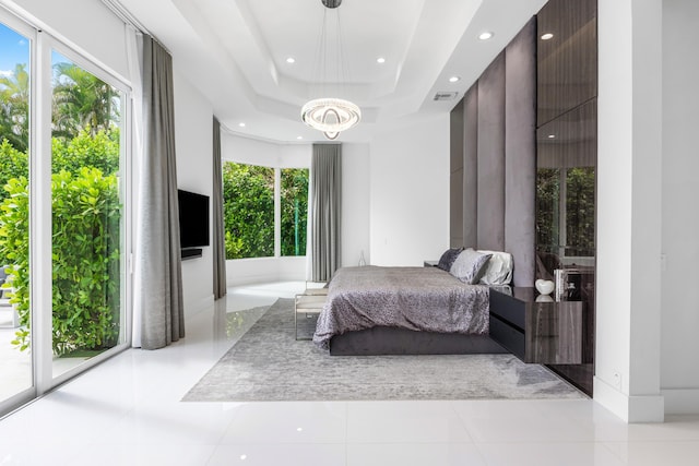 5784 Vintage Oaks Cir, Delray Beach, FL 33484 - bedroom featuring a raised ceiling, a chandelier, visible vents, recessed lighting, and tile patterned floors