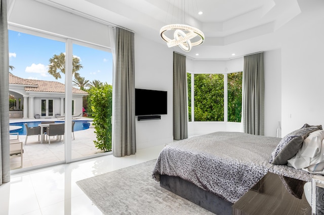 5784 Vintage Oaks Cir, Delray Beach, FL 33484 - bedroom with tile patterned floors, recessed lighting, a notable chandelier, and access to outside