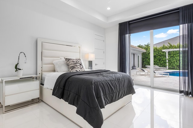 5784 Vintage Oaks Cir, Delray Beach, FL 33484 - tiled bedroom featuring a raised ceiling, recessed lighting, and access to exterior