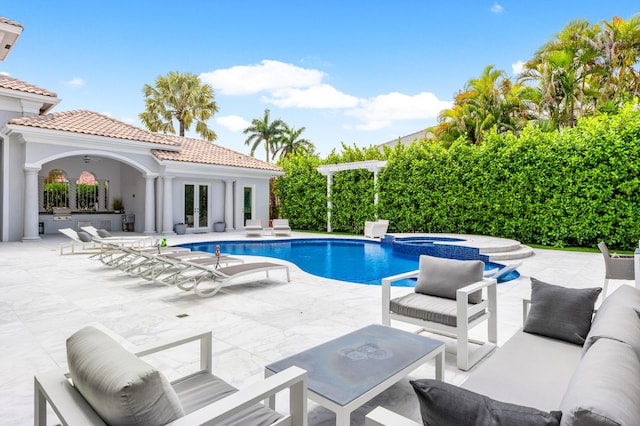 5784 Vintage Oaks Cir, Delray Beach, FL 33484 - view of pool featuring outdoor lounge area, a patio area, french doors, and a pool with connected hot tub
