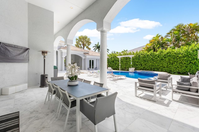 5784 Vintage Oaks Cir, Delray Beach, FL 33484 - view of patio / terrace with outdoor dining space, an outdoor hangout area, and a pool with connected hot tub