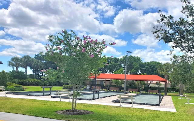 8454 Logia Cir, Boynton Beach, FL 33472 - surrounding community with a lawn