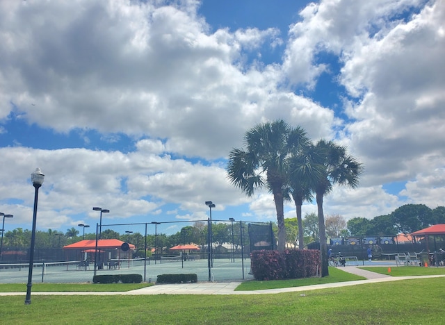8454 Logia Cir, Boynton Beach, FL 33472 - view of sport court with fence and a yard
